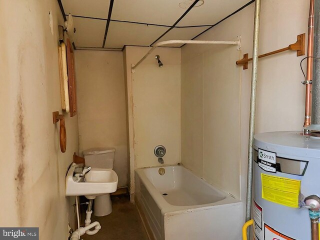 full bath featuring toilet, gas water heater, and bathing tub / shower combination