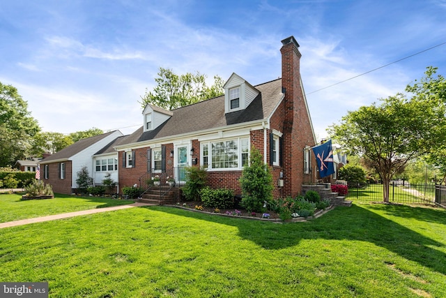 1217 Stafford Ave, Fredericksburg, VA 22401 - cape cod-style house featuring fence, a chimney, a front yard, and brick siding
