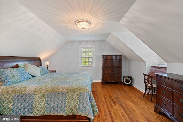 1217 Stafford Ave, Fredericksburg, VA 22401 - bedroom featuring baseboards, vaulted ceiling, and wood finished floors