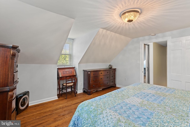 1217 Stafford Ave, Fredericksburg, VA 22401 - bedroom featuring baseboards, wood finished floors, and lofted ceiling