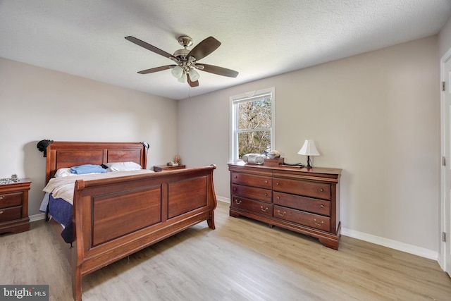9225 Milnor St, Philadelphia, PA 19114 - bedroom featuring light wood-style floors, a ceiling fan, and baseboards