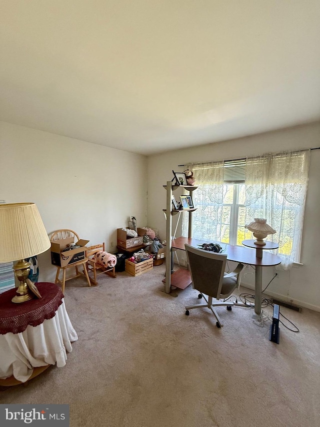 view of carpeted home office