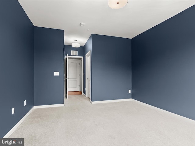 601 Quicksilver Ct Unit 401, Reisterstown, MD 21136 - unfurnished bedroom featuring light colored carpet and baseboards