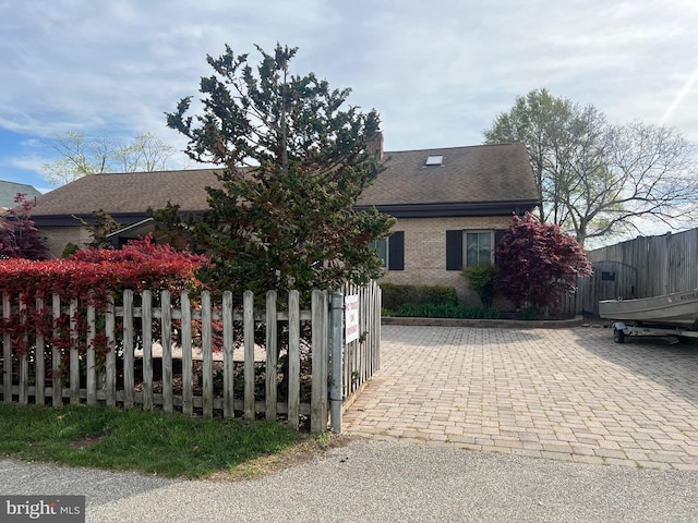 3689 1st Ave, Edgewater, MD 21037 - view of front of home featuring roof with shingles and a gate