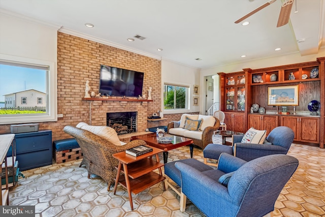 3689 1st Ave, Edgewater, MD 21037 - living area featuring ceiling fan, a fireplace, ornamental molding, and recessed lighting