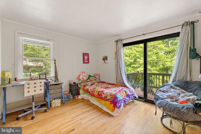 11713 Henderson Rd, Clifton, VA 20124 - bedroom with access to exterior, wood finished floors, multiple windows, and ornamental molding