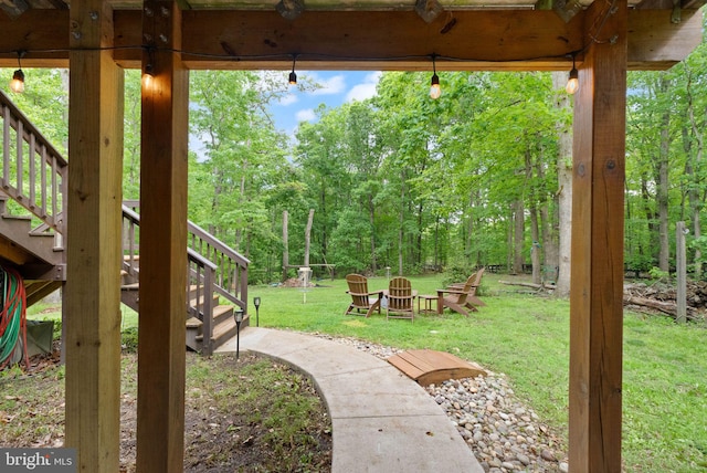 11713 Henderson Rd, Clifton, VA 20124 - view of grassy yard featuring stairs and a wooded view