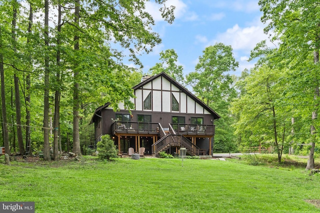 11713 Henderson Rd, Clifton, VA 20124 - back of property with a wooden deck, stairs, a lawn, and a chimney