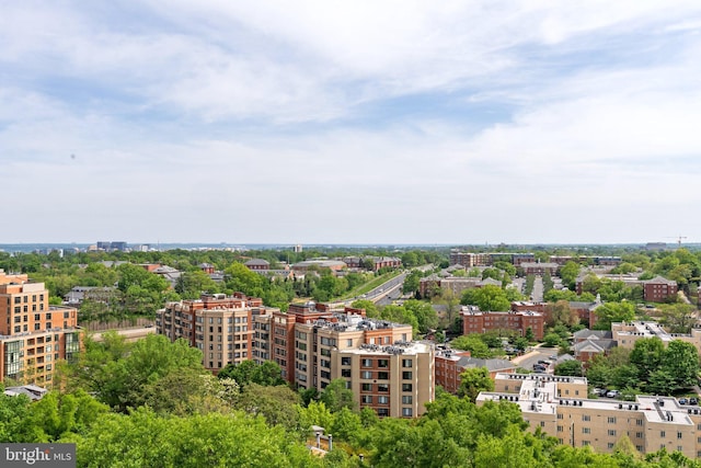 birds eye view of property with a view of city