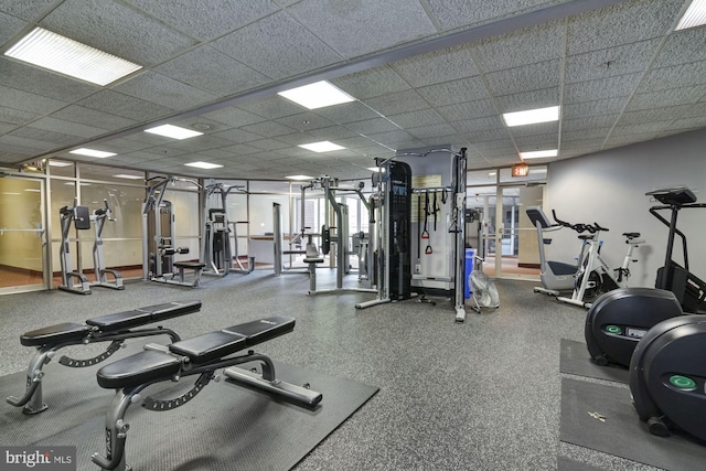 gym featuring a drop ceiling