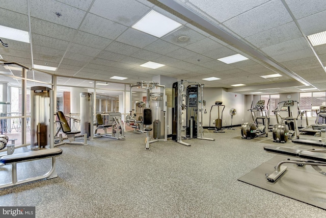 gym featuring a drop ceiling