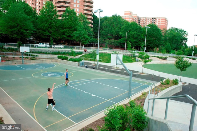 view of sport court with fence and community basketball court