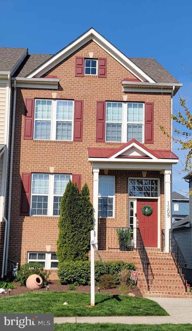 view of front of property with brick siding