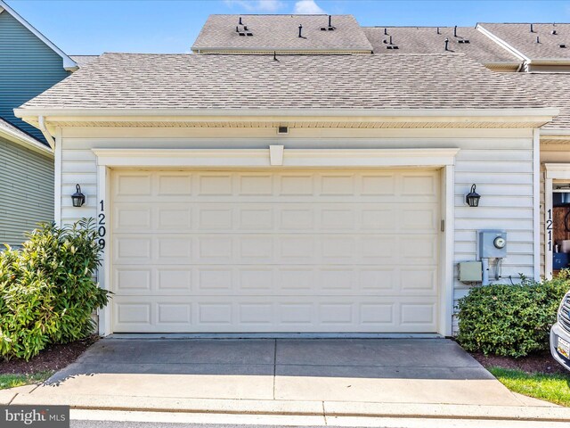 garage featuring driveway