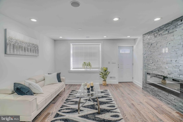 2832 Edgemont St, Philadelphia, PA 19134 - living area with recessed lighting, wood finished floors, baseboards, and plenty of natural light