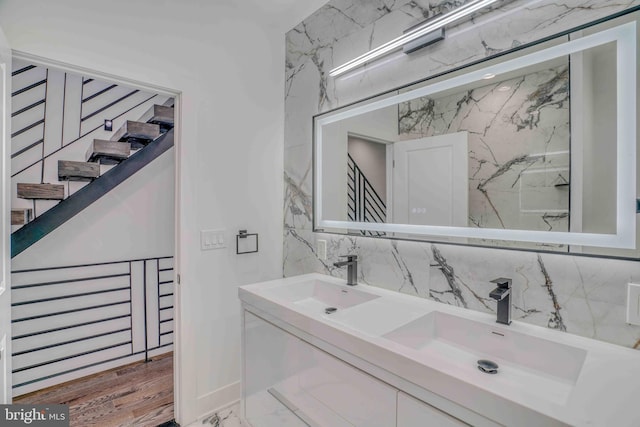 2832 Edgemont St, Philadelphia, PA 19134 - bathroom featuring backsplash, a sink, and double vanity