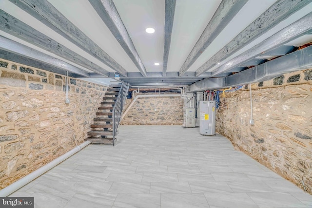 2832 Edgemont St, Philadelphia, PA 19134 - unfinished basement featuring stairway, water heater, and recessed lighting
