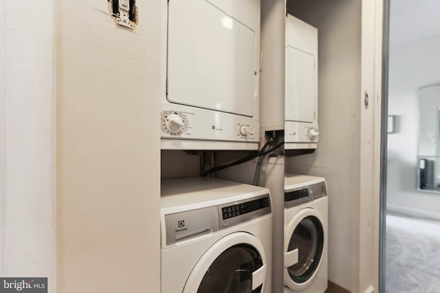 2141 P St NW Unit 1010, Washington, DC 20037 - laundry area with laundry area, carpet, and stacked washer and clothes dryer