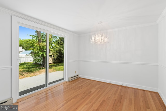 103 W Marengo, Saint Michaels, MD 21663 - unfurnished dining area featuring baseboard heating, baseboards, light wood finished floors, an inviting chandelier, and crown molding