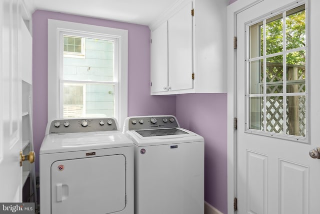 103 W Marengo, Saint Michaels, MD 21663 - laundry area featuring washing machine and dryer, a wealth of natural light, and cabinet space