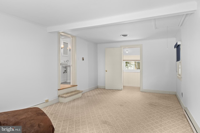 103 W Marengo, Saint Michaels, MD 21663 - carpeted empty room featuring a sink, attic access, baseboards, and visible vents