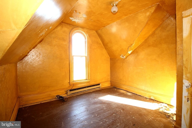 bonus room with a baseboard radiator and vaulted ceiling