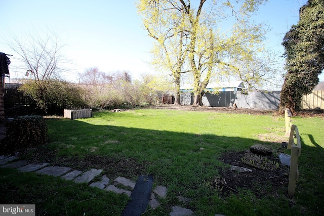 view of yard featuring fence