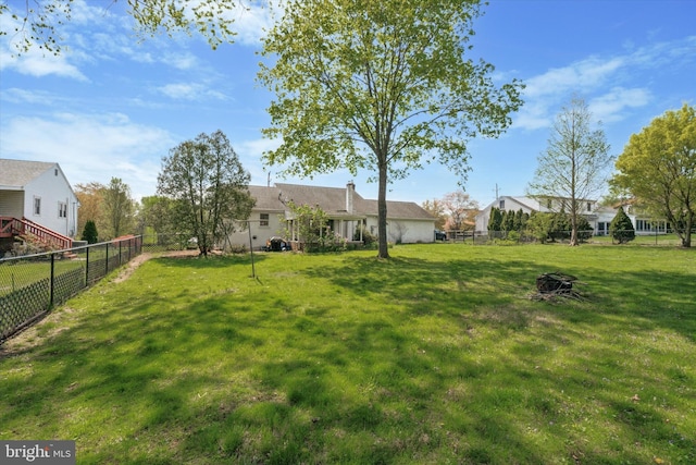 view of yard with fence