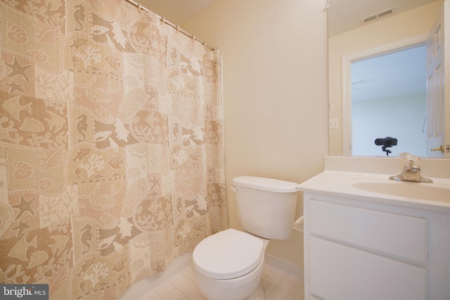 15648 Avocet Loop, Woodbridge, VA 22191 - bathroom with visible vents, vanity, tile patterned floors, baseboards, and toilet