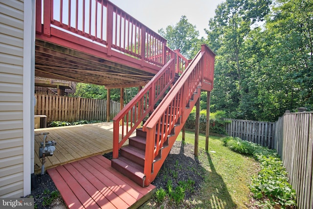 15648 Avocet Loop, Woodbridge, VA 22191 - wooden deck with stairs, a fenced backyard, and a yard
