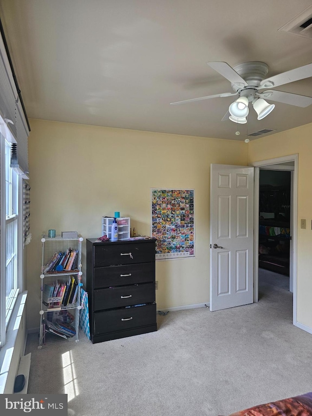 bedroom featuring visible vents, carpet, ceiling fan, and baseboards