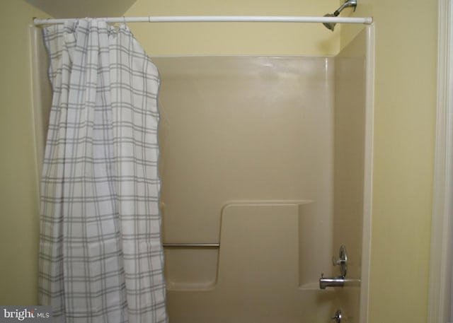 full bath featuring shower / bathtub combination with curtain