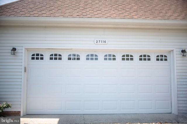 garage featuring driveway