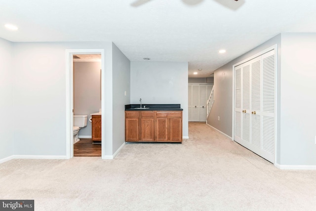 bar with recessed lighting, baseboards, a ceiling fan, and light colored carpet