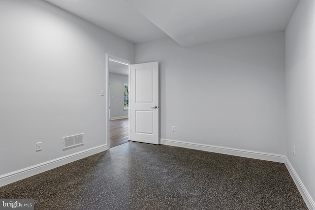 238 N Aberdeen Ave Lot 2, Wayne, PA 19087 - spare room featuring baseboards, dark speckled floor, and visible vents