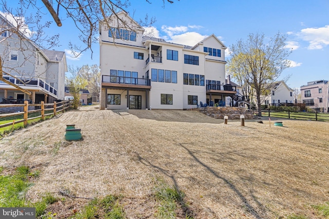 238 N Aberdeen Ave Lot 2, Wayne, PA 19087 - rear view of property featuring a residential view, a balcony, and fence