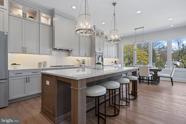 238 N Aberdeen Ave Lot 2, Wayne, PA 19087 - kitchen featuring an island with sink, a chandelier, stainless steel appliances, light countertops, and recessed lighting
