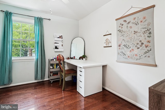 office area featuring a ceiling fan, baseboards, and dark wood-style floors