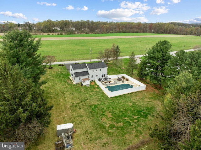 birds eye view of property featuring a rural view