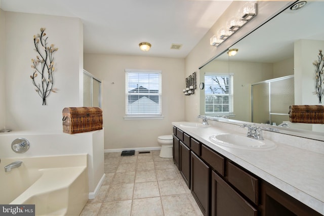 full bathroom featuring a healthy amount of sunlight, baseboards, and a sink