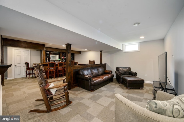 living area with baseboards, recessed lighting, a bar, and carpet