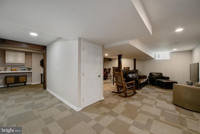 living room with light carpet, baseboards, and recessed lighting