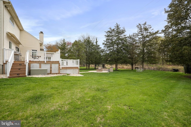 view of yard featuring a deck
