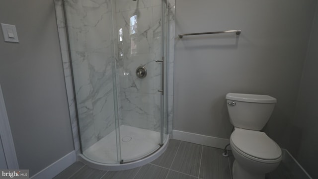 3220 Byberry Rd, Philadelphia, PA 19154 - bathroom with a marble finish shower, toilet, and baseboards