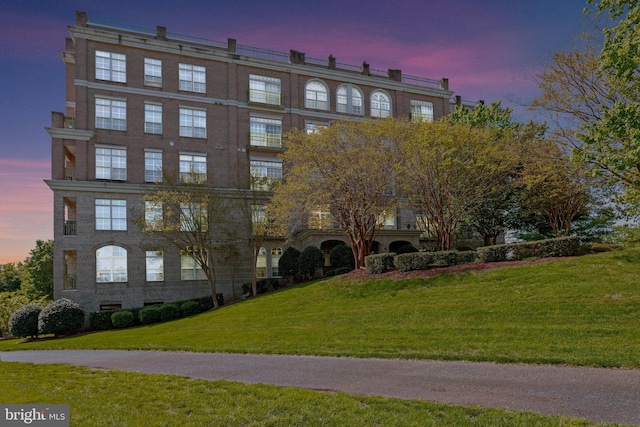 view of property at dusk