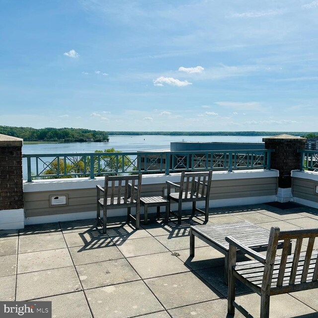 view of patio / terrace featuring a water view