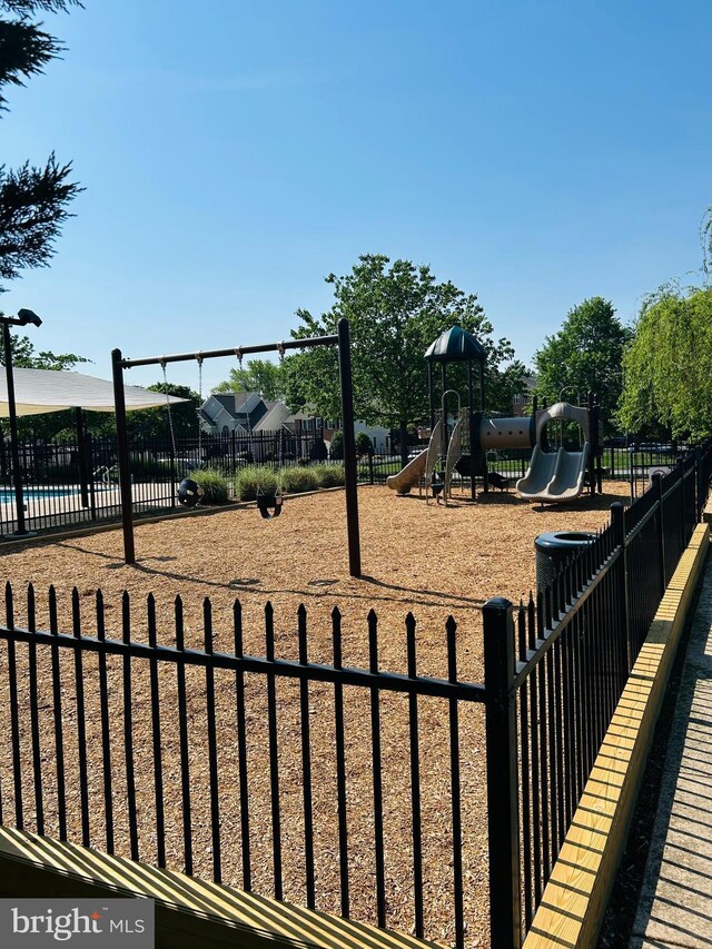 community play area featuring fence