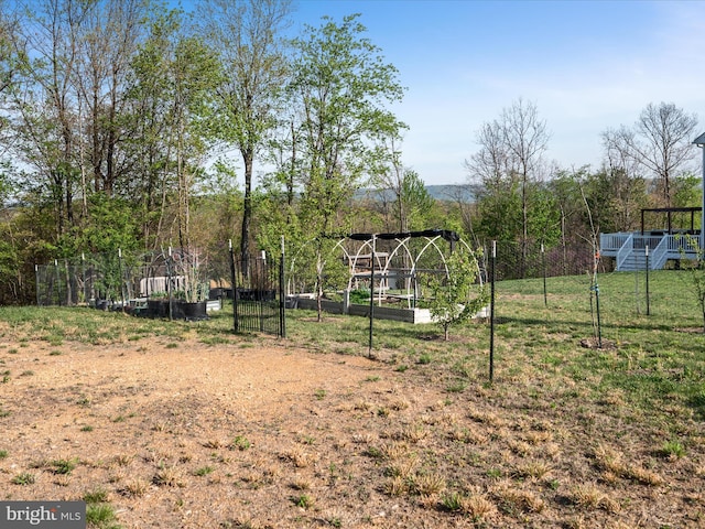 view of yard featuring a garden and fence