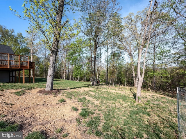 view of yard with a deck