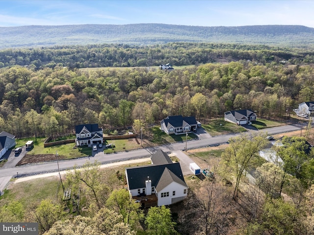 bird's eye view featuring a view of trees